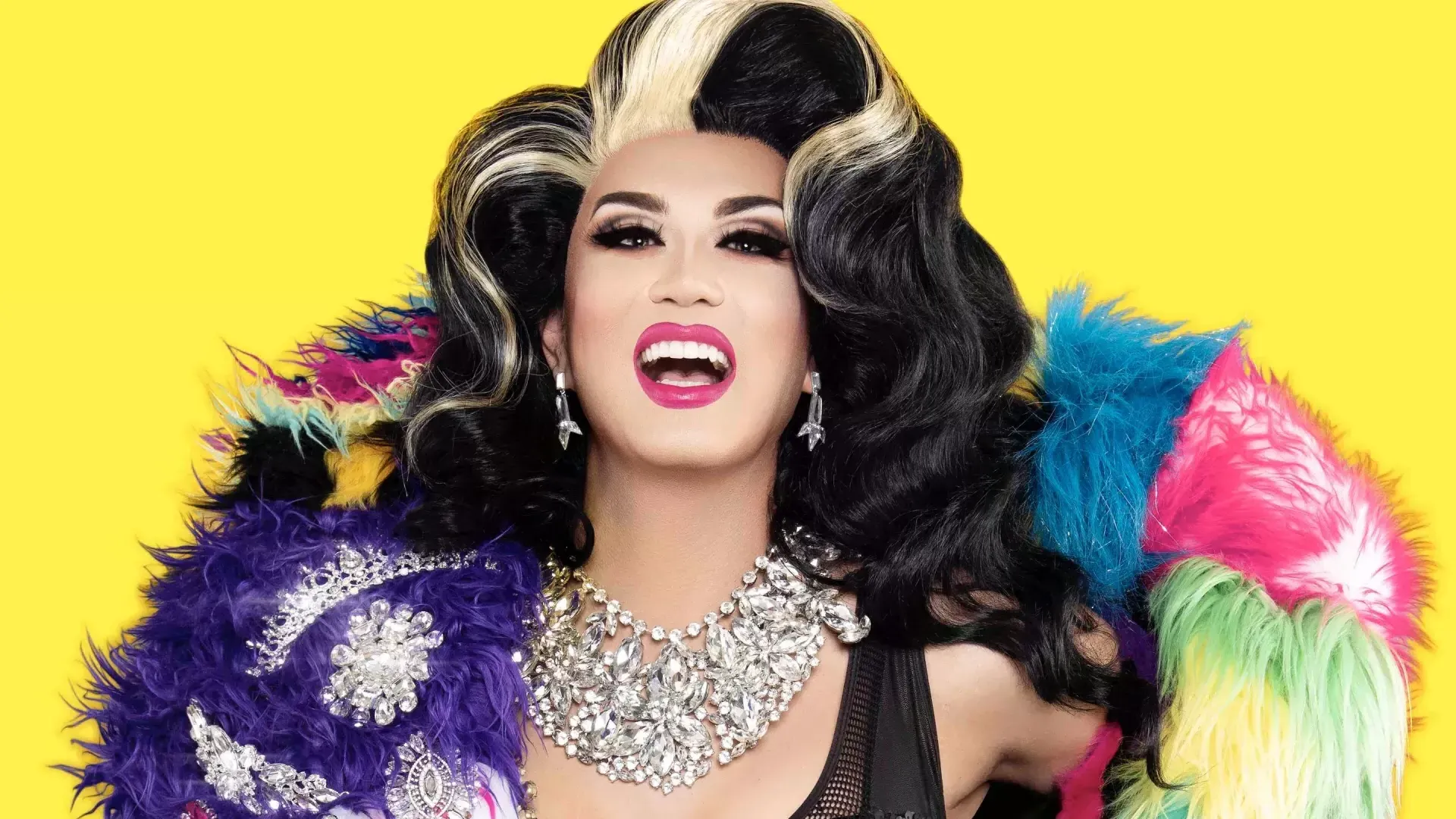 Drag Queen Manila Luzon with a yellow background